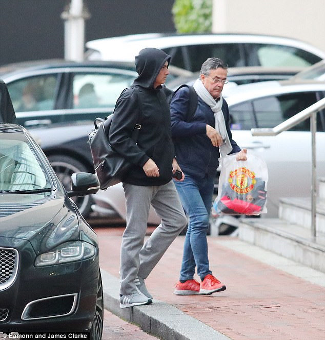 Mourinho was in the company of 61-year-old Red Devils club scout Ricardo Formosinho (right)