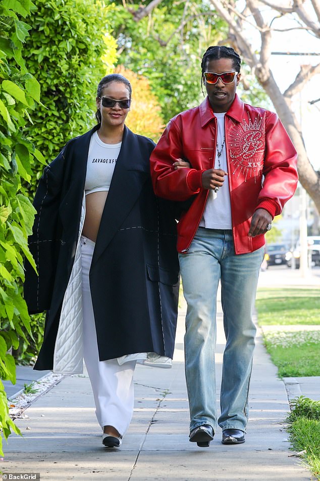 Sweet: Pregnant Rihanna and her beau A$AP Rocky looked as in love as ever as they stepped out in Los Angeles on Wednesday, after their son's unique name was finally revealed