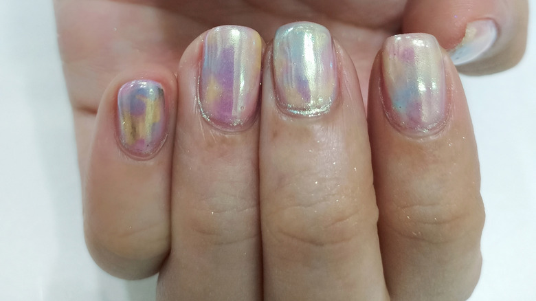 Chrome manicure on short nails